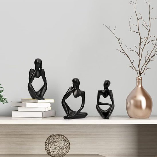 sculpture forme humain assis vase