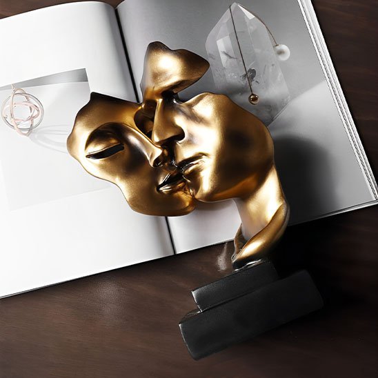 sculpture deux visage or