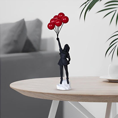 sculpture fillette ballon rouge