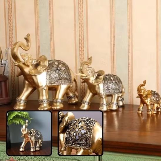 sculpture trois elephant marchent