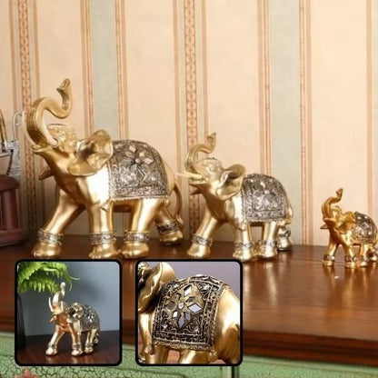 sculpture trois elephant marchent