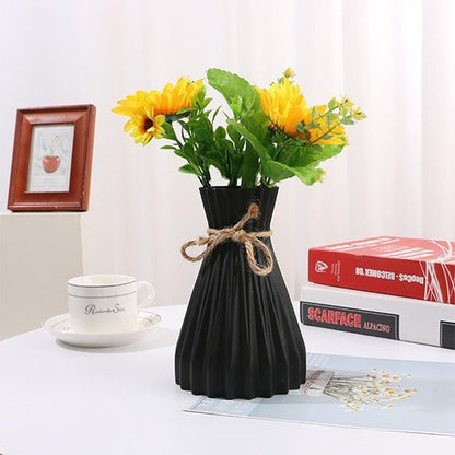 tasse Vase noir fleur jaune livre